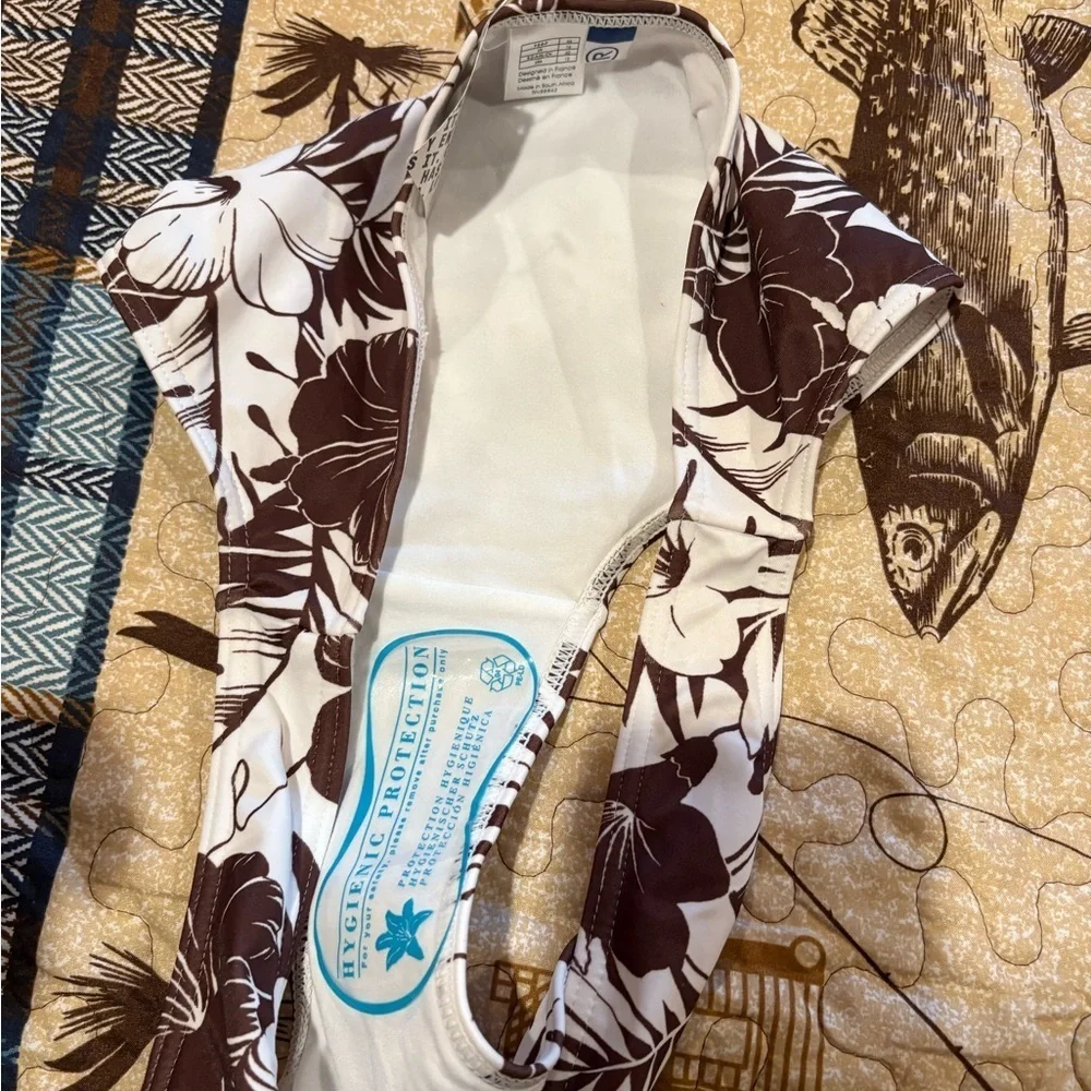 Roidal brand bikini swimsuit featuring a brown and white floral print NWT
